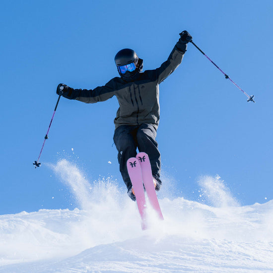 Skier riding pink Faction Dancer 1 piste skis