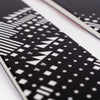 Close-up of Faction Prodigy 4, black and white freeride ski.