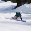 Girl skier carving on purple Dancer 2 all-mountain skis