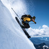 Skier jumping using Faction La Machine 3 black and purple touring skis